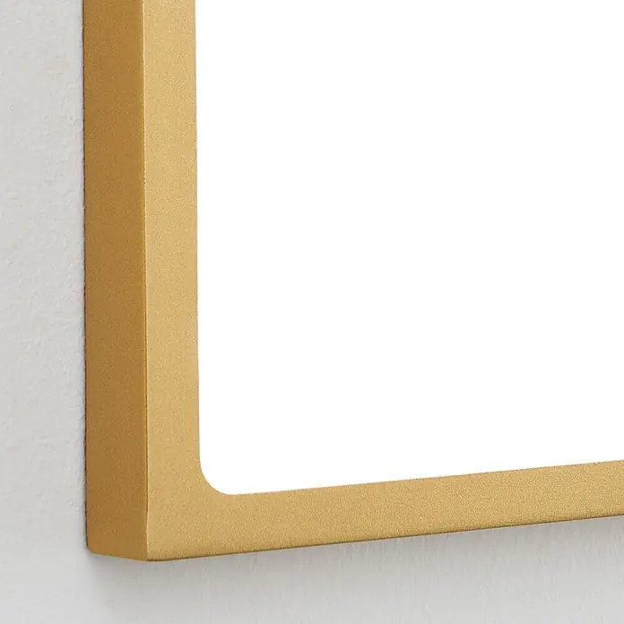 Orion Leuchten LED-Deckenleuchte rund -  - Nahaufnahme einer goldenen, texturierten Rahmen-Ecke mit abgerundeter Innenkante.