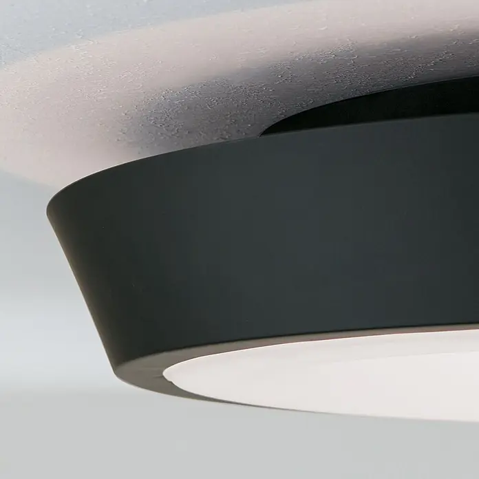 Orion Leuchten LED-Deckenleuchte rund -  - Dunkelgraue Deckenleuchte mit beleuchteter weißer Basis, die Licht an die Decke wirft.