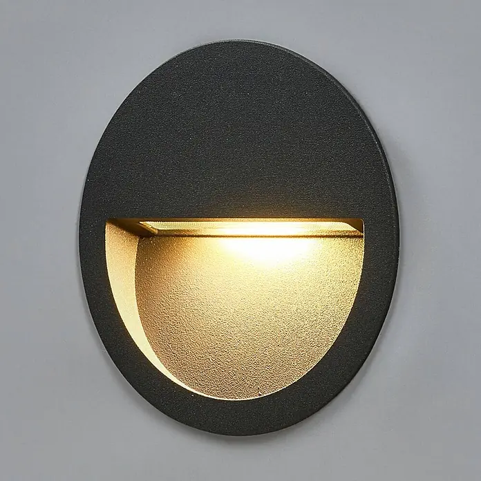 Lucande Außenwandleuchte Loya - 11,5 x 11,5 x 5,5 cm, schwarz, schwarz, IP54 - Runde, dunkelgraue, granulierte Wandleuchte mit warmer LED-Beleuchtung.