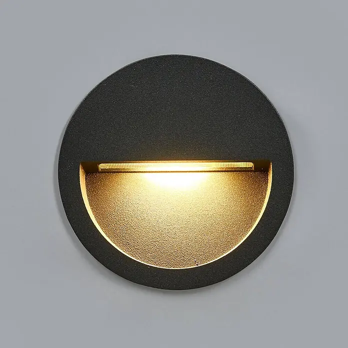 Lucande Außenwandleuchte Loya - 11,5 x 11,5 x 5,5 cm, schwarz, schwarz, IP54 - Runde, dunkelgraue, strukturierte Einbauleuchte mit warmem, gelbem Abwärtslicht.
