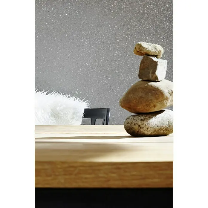 Knauf Putz-Abtönfarbe Compact Color - Schiefer, 2 g - Zen-inspirierte Tischdekoration mit gestapelten Steinen, die Ruhe und Ausgeglichenheit in jeden Raum bringt.