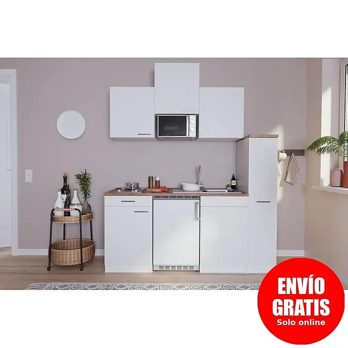 Respekta Cocina compacta Luis - Ancho: 180 cm, Blanco, Color del cuerpo: Blanco, Con placa de cocina doble y microondas - Cocina compacta blanca con encimera de madera, fregadero, vitrocerámica, microondas y electrodomésticos integrados. Un carrito con botellas al lado.