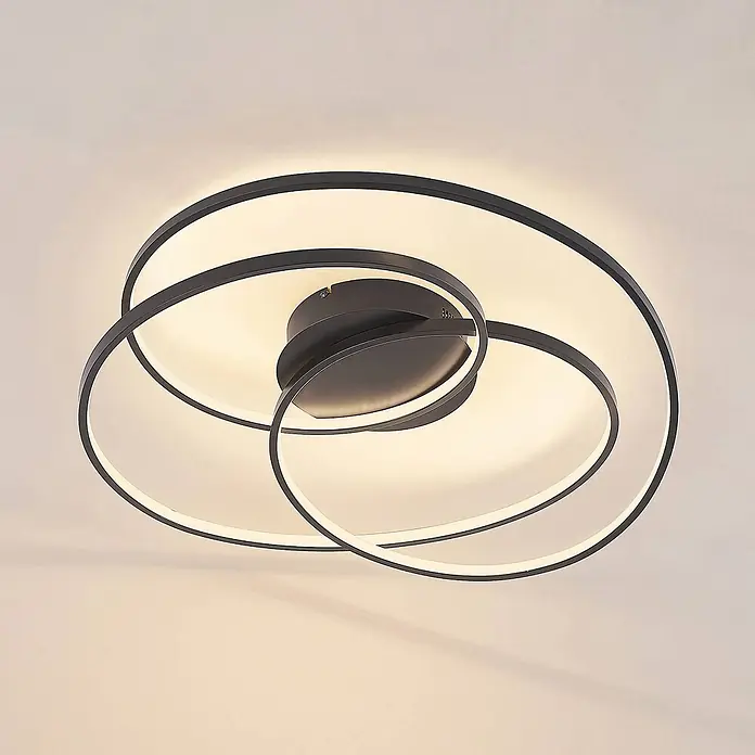 Lindby Deckenleuchte Kateryna - schwarz - Moderne dunkelgraue LED-Deckenleuchte mit überlappenden, beleuchteten Ringen.