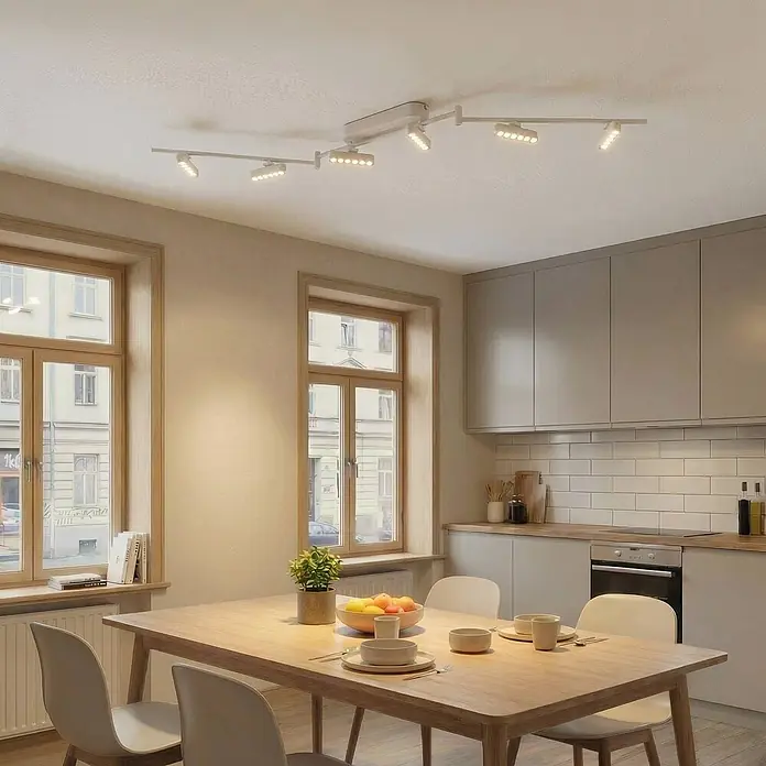 Lindby Deckenstrahler Eldrin - weiß / opal, weiß / opal - Weiße Metall-Deckenleuchte mit mehreren verstellbaren LED-Spots, die eine moderne Küche und einen Essbereich beleuchten.
