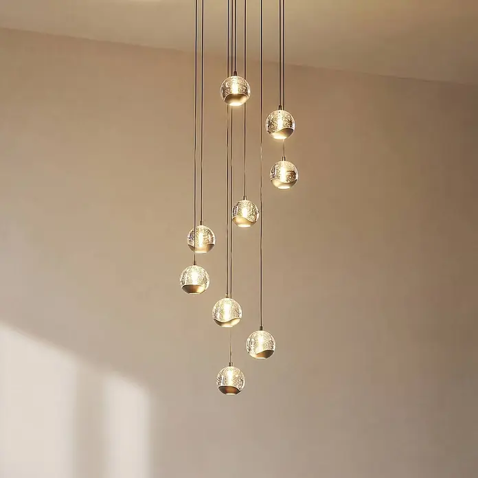 Lucande Pendelleuchte Hayley - L x B x H: 35 x 35 x 150 cm, klar / transparent, klar, Schwarz - Moderne Hängeleuchte mit neun kugelförmigen, texturierten Glaslichtern und Metallkappen, die unterschiedlich lang herabhängen.
