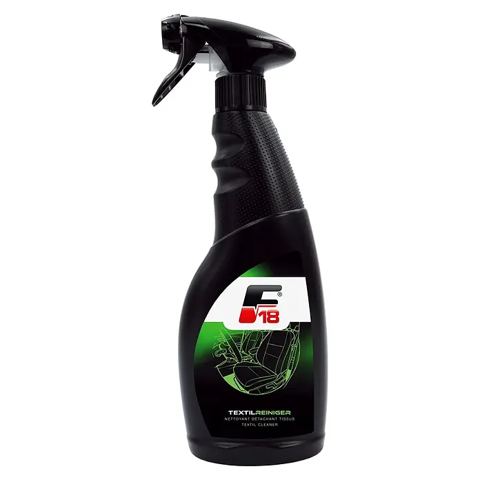 F18 Textilreiniger - 500 ml - Schwarze Sprühflasche aus Kunststoff mit strukturiertem Griff und Etikett mit Autoinnenraum-Umriss und „Textilreiniger“.