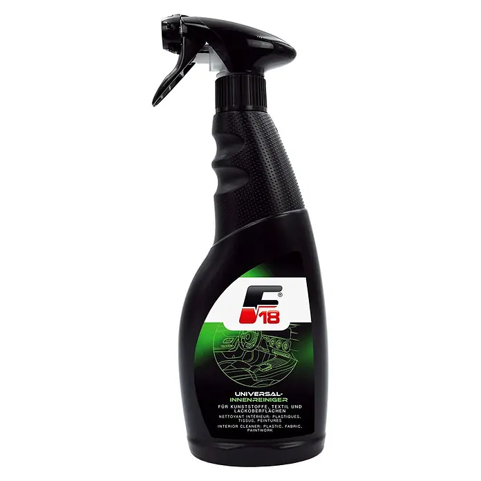 F18 Auto-Innenraumreiniger - 500 ml - Schwarze Sprühflasche F V18 Universal-Innenreiniger für Kunststoff, Textil und Lackoberflächen, mit grün-weißem Etikett.