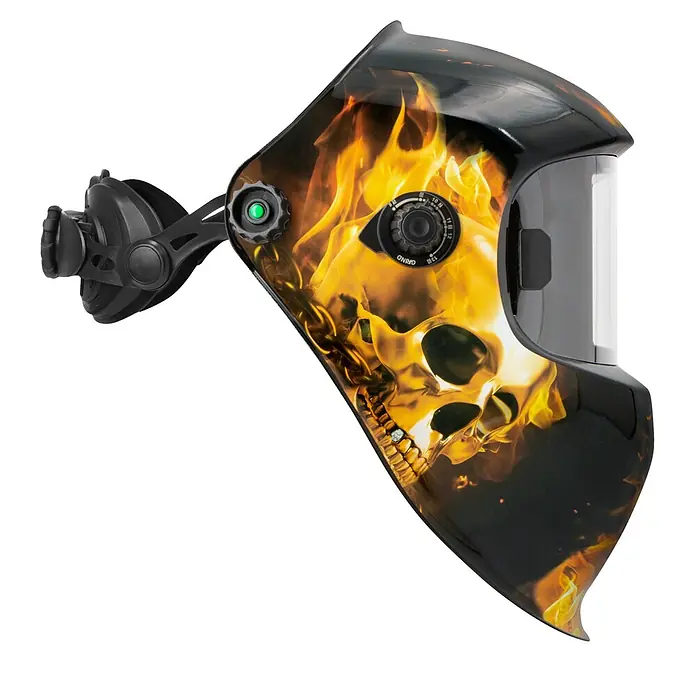 Gys Casco de soldadura Fireman - Universal, Nivel de protección: 9 ud. - 13 ud. - Casco de soldadura negro con gráfico de llama y calavera naranja/amarilla, perillas de ajuste visibles y arnés oscuro.