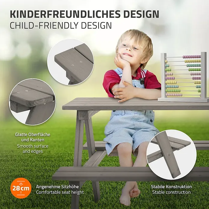 ML-Design Kinder-Picknicktisch Grau Picknicktisch Sitzgarnitur 2 Bänke mit Tisch Massivholz Outdoor - L x B x H: 90 x 78,5 x 50,5 cm, Holz - Grauer Kindertisch aus Holz mit einem darauf sitzenden Kind, der glatte Kanten und stabile Bauweise hervorhebt.