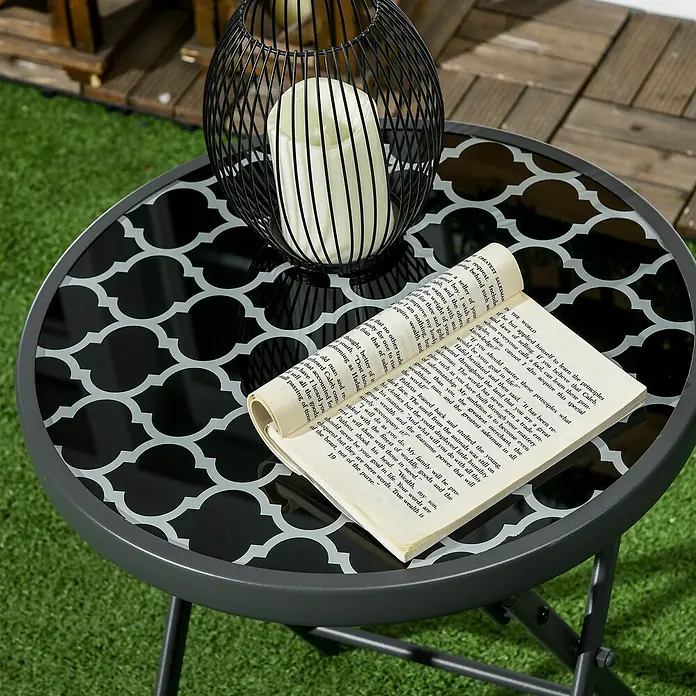 Outsunny Garten-Beistelltisch - L x B x H: 45 x 45 x 50 cm, Schwarz - Runder grauer Metall-Beistelltisch für den Außenbereich mit gemusterter schwarzer Glasplatte, Laterne und Buch.