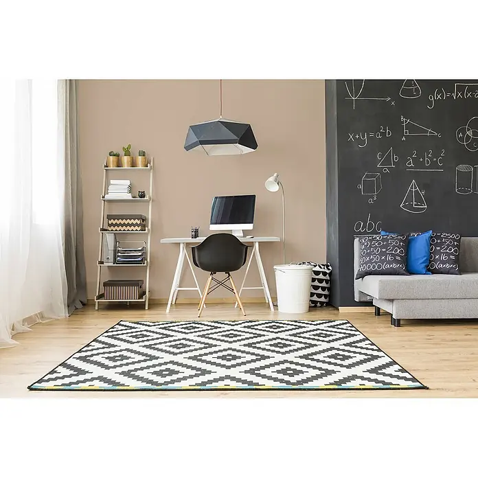 Livingwalls Wandfarbe Beige Soothing Brown DD126052 1l - Beige, Matt, 1 l - Schwarz-weißer Teppich mit geometrischem Muster auf einem Holzfußboden in einem Arbeitszimmer.