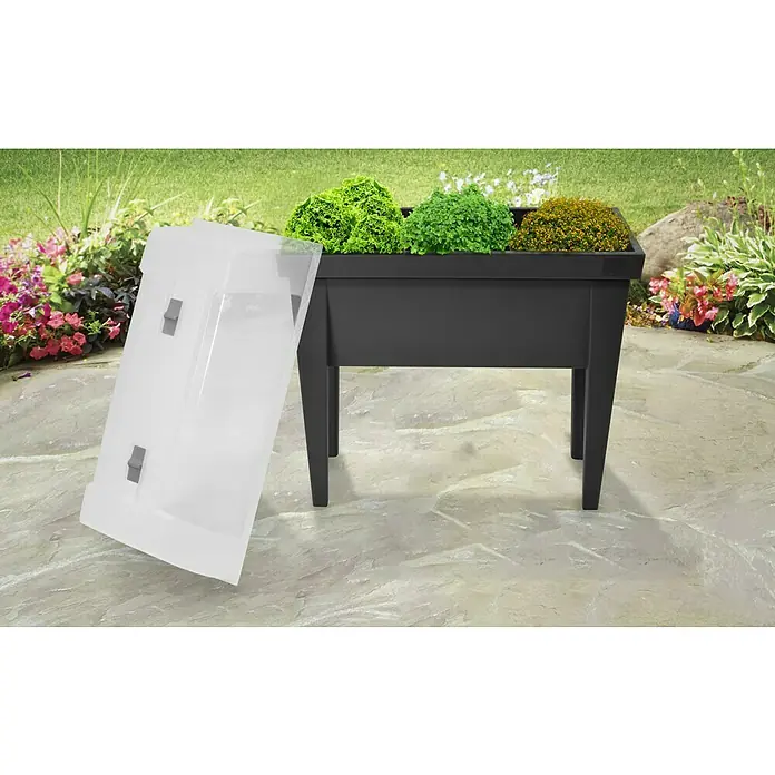 Huerto elevado con tapa - 80 x 40 x 88 cm, Plástico, Antracita - Una jardinera negra con patas y una cubierta transparente, ideal para cultivar verduras y hierbas en el jardín o en el patio.