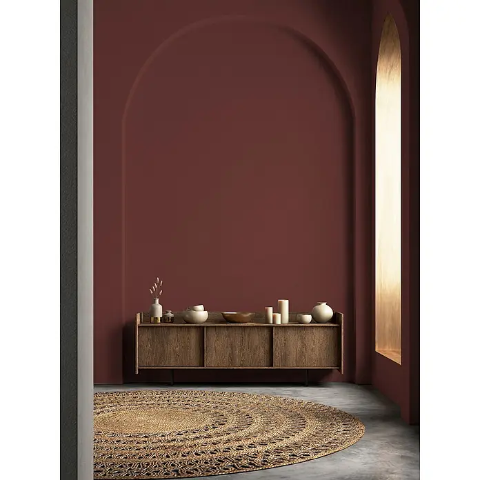 Livingwalls Wandfarbe Rot Varied Red DD125837 2,5l - Rot, Matt, 2,5 l - Ein runder, naturfarbener Flechtteppich aus Jute mit Muster auf Betonboden.