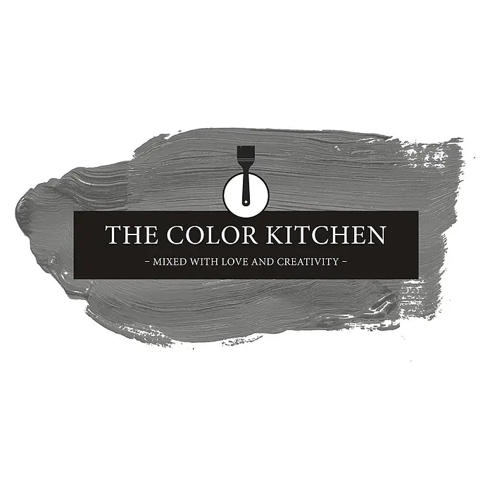 Livingwalls Wandfarbe Grau Chic Chia 1006 2,5l - Matt, 2,5 l - Logo für The Color Kitchen mit einem grauen Pinselstrich, einem schwarzen Banner mit weißem Text und einem weißen Kreis mit schwarzem Pinsel-Symbol.