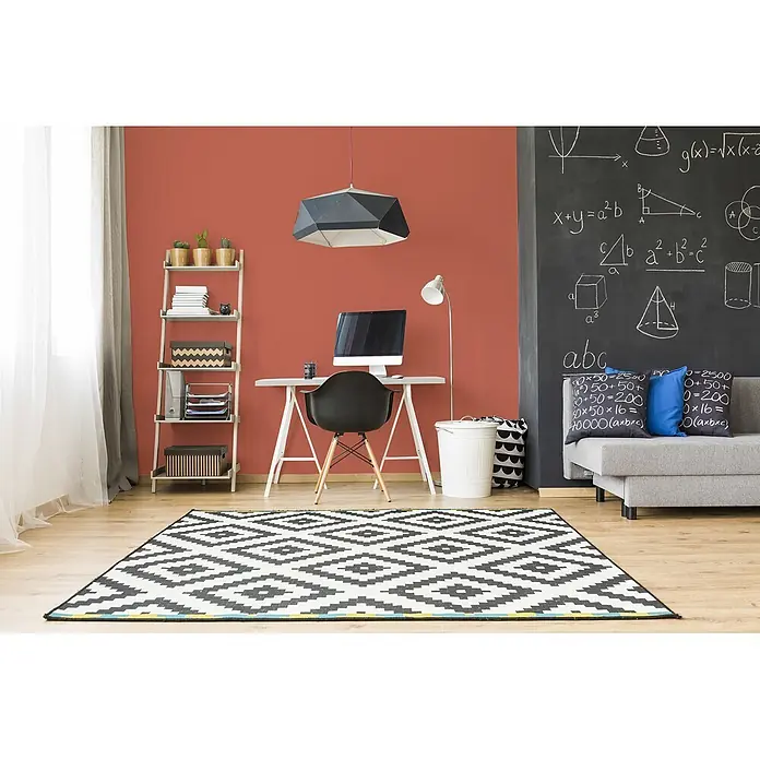Livingwalls Wandfarbe Rot Dusty Orange DD126162 5l - Rot, Matt, 5 l - Schwarz-weißer Teppich mit geometrischem Muster in einem modernen Arbeitszimmer.