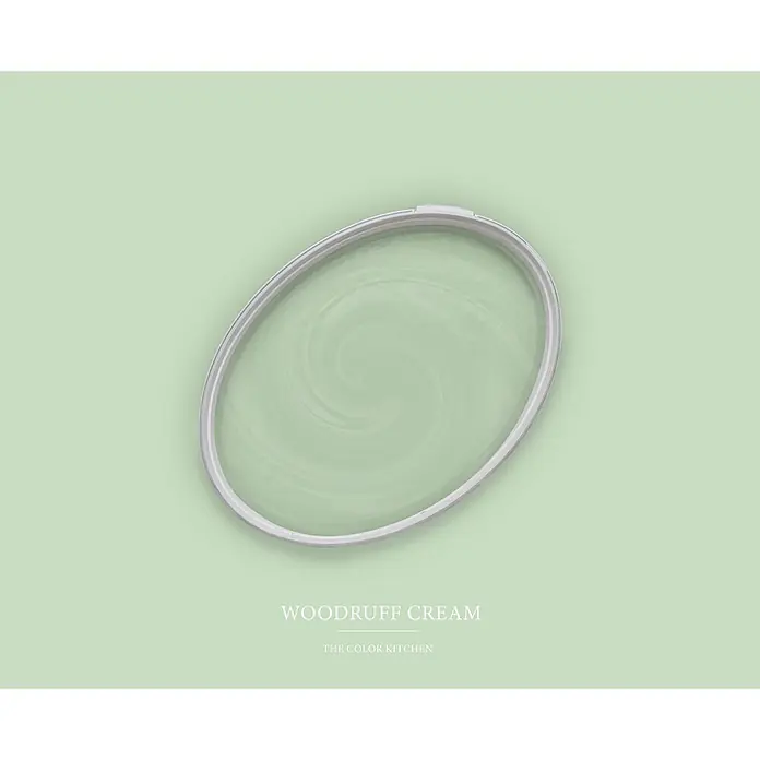 Livingwalls Wandfarbe Grün Woodruff Cream 4007 2,5l - Matt, 2,5 l - Offener Metall-Farbdosendeckel mit geschwungener hellgrüner Farbe (Woodruff Cream) darin.