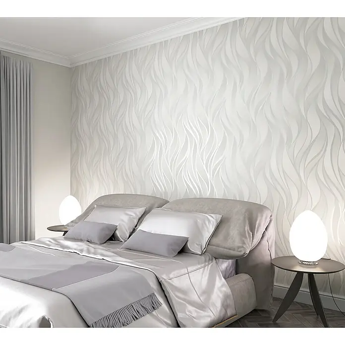 Livingwalls Vliestapete Grafisch, beige - beige, 10.050 x 530 mm - Elegante hellgraue Tapete mit schimmerndem Wellenmuster, die ein modernes und ruhiges Schlafzimmer verschönert.