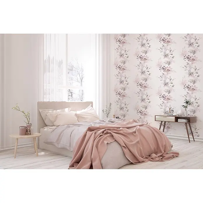 Livingwalls Vliestapete Floral, weiß-rosa - 10.050 x 530 mm - Gemütliches Schlafzimmer mit Bett in Rosa- und Grautönen, Nachttisch und floraler Tapete.