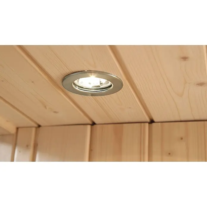 Weka Infrarotkabine Hamina - 103,5 x 138 x 190 cm, 2.050 Watt (W) - Heller, silberner Einbaustrahler in einer hellen Holzdecke, der den Holzinnenraum beleuchtet.