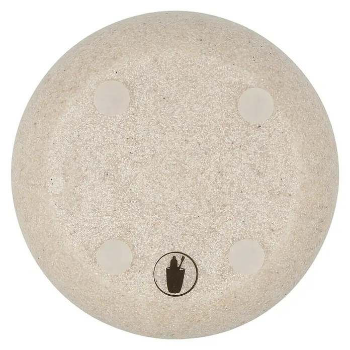 Venus Empire Zahnputzbecher - Polyresin, Sand - Nahaufnahme der Unterseite eines beigen Accessoires, die eine körnige Textur und kreisförmige, selbstklebende Füße aufweist.