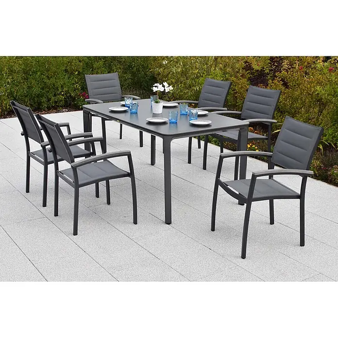Merxx Gartentisch-Set Pisa - Gesamtumfang: 7 -tlg., L x B x H: 160 x 90 x 76,5 cm, Aluminium/Textil, Stapelbar - Graues Outdoor-Essset mit Tisch und acht Stühlen auf einer Terrasse.