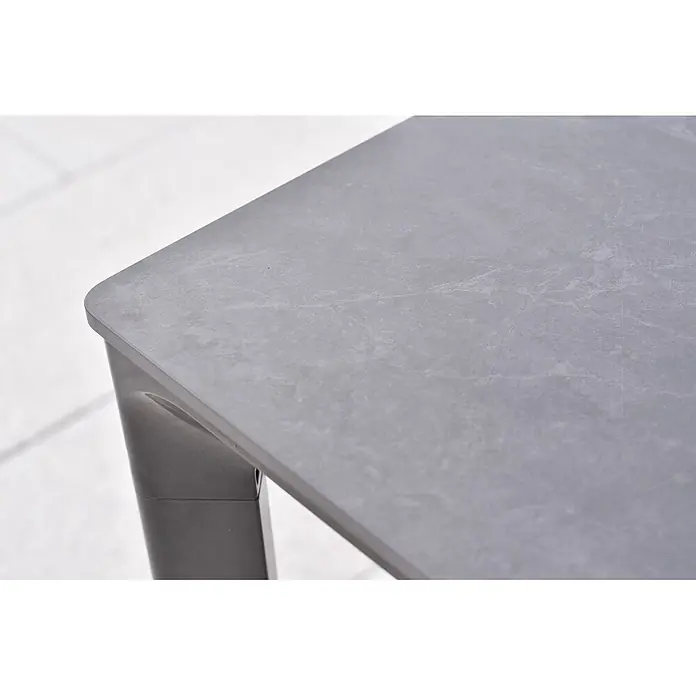 Merxx Gartentisch-Set Pisa - Gesamtumfang: 7 -tlg., L x B x H: 160 x 90 x 76,5 cm, Aluminium/Textil, Stapelbar - Graue Tischecke mit Steinoptik-Oberfläche und dunkelgrauem Bein.
