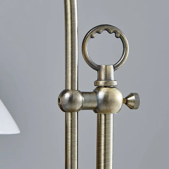 Lindby Tischleuchte Otis - bronze / altmessing, E14 - Verstellbares Lampengelenk aus Antikmessing mit Feststellschraube und Zierring.