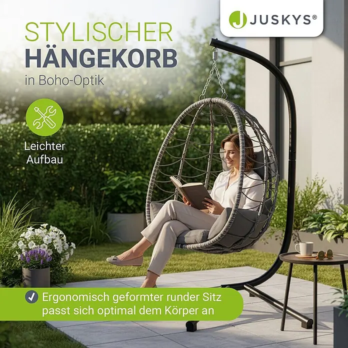 Juskys Hängesessel Aria - L x B x H: 95 x 95 x 196 cm, Kunststoff, Grau - Stilvoller grauer Hängekorb mit schwarzem Gestell. Ergonomisch und leicht aufzubauen, eine Frau entspannt lesend darin.