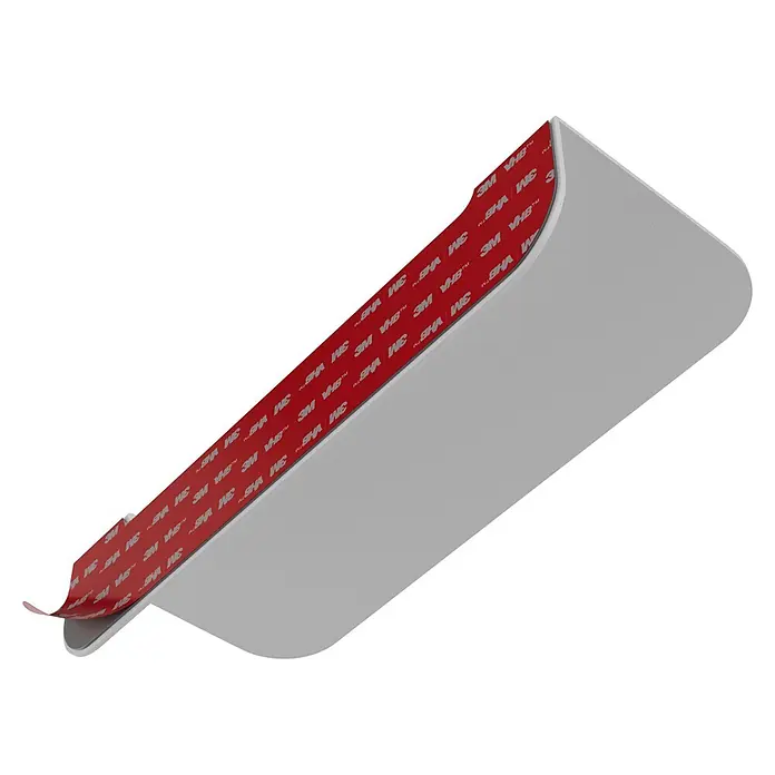 Camargue Antwerpen Ablage - Breite: 15 cm, Weiß, Matt - Graues Objekt mit rotem 3M VHB Klebeband, teilweise abgezogen, um die Klebefläche zu zeigen.