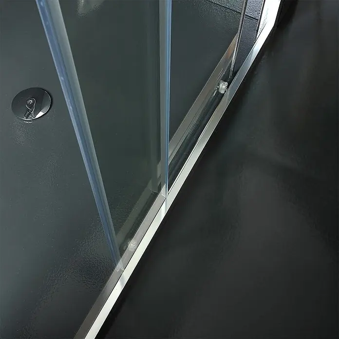 Kiamami Valentina Nischendusche - Transparent, 6 mm - Dunkelgraue Duschwanne mit Abfluss, klarer Glasduschwand und Metallrahmen.