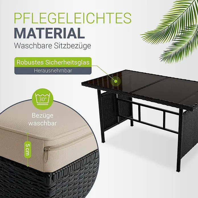 Juskys Loungemöbel-Set Manacor - 5 -tlg., Gestell: Stahl, pulverbeschichtet; Geflecht: Polyrattan; Tischplatten: Sicherheitsglas; Sitzkissen: 100 % Schaumstoff; Bezüge: 100 % Polyester; Abdeckung: 420D Oxford-Gewebe (100 g/m²), PU-Beschichtung, Creme - Schwarzer Outdoor-Tisch in Rattan-Optik mit abnehmbarer Sicherheitsglasplatte und einem beigen Kissen, das seine 5 cm Dicke und den waschbaren Bezug zeigt.