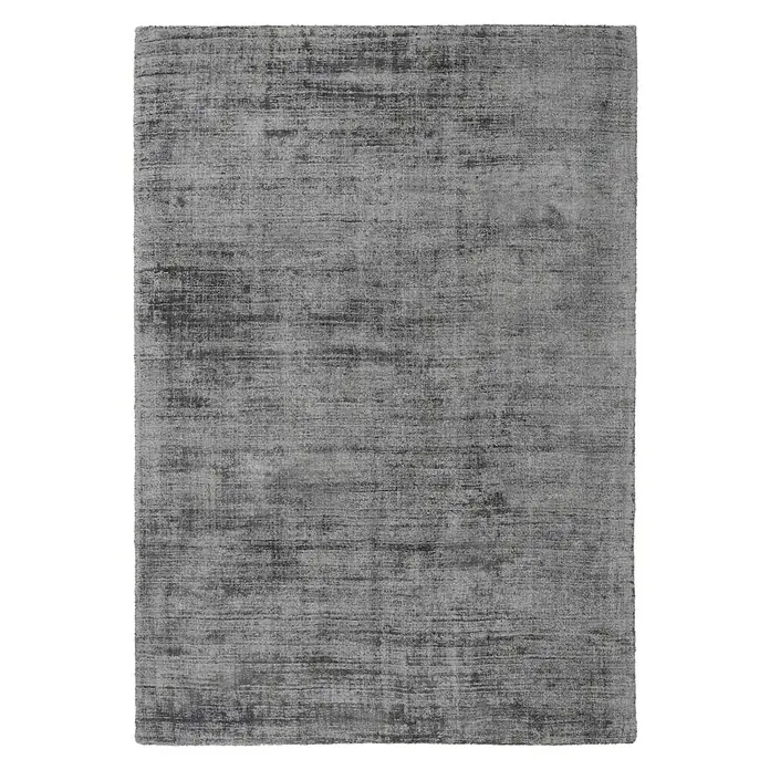 Kayoom Kurzflorteppich Luxury 110 - Grau, 150 x 80 cm, 100 % Viskose - Ein grauer Teppich mit melierter Textur. Er ist rechteckig und hat ein dezentes, elegantes Muster, ideal für moderne Wohnräume.