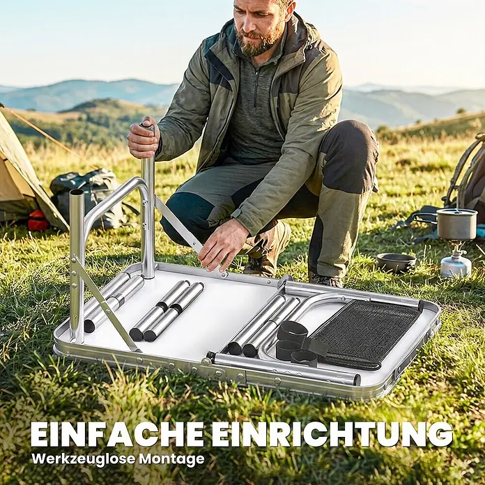Outsunny Campingtisch - MDF (Mitteldichte Faserplatte), Schwarz - Ein Mann baut einen silbernen Aluminium-Campingtisch mit schwarzen Netzelementen im Freien auf. Einfache, werkzeuglose Montage.