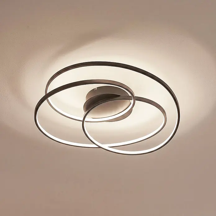 Lindby Deckenleuchte Kateryna - schwarz - Moderne dunkle LED-Deckenleuchte mit ineinandergreifenden, spiralförmigen Ringen an der Decke.