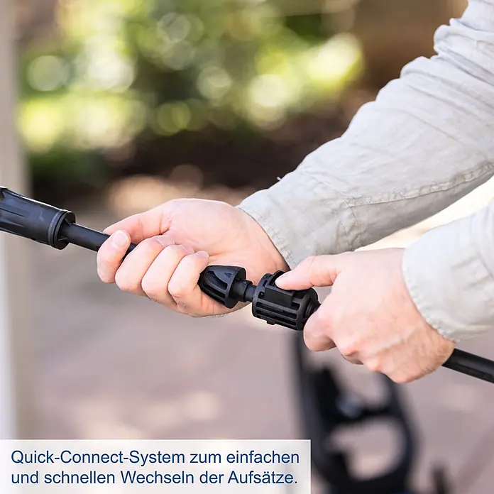 Scheppach Hochdruckreiniger SHD150 - 1.800 W, Max. Druck: 150 bar, Fördermenge: 420 l/h - Hände verbinden ein schwarzes Quick-Connect-System für Werkzeugaufsätze, das schnelle Wechsel ermöglicht.