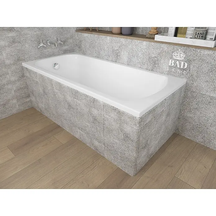 Bad Land Badewanne CLASSIC Acryl-Eckwanne 150 x 75 cm Weiß - Sanitäracryl, Weiß - Weiße Einbauwanne mit grauer Fliesenverkleidung im Badezimmer.