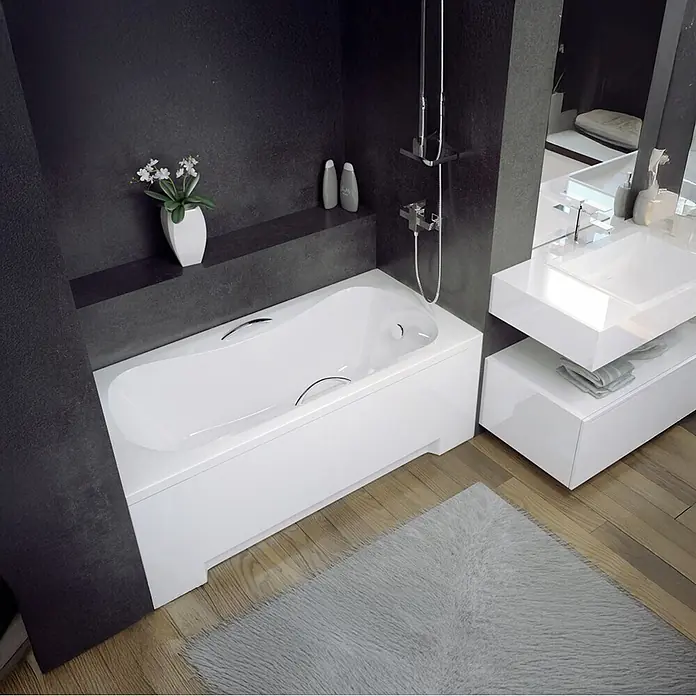 Bad Land Badewanne ARIA PLUS Acryl-Eckwanne 160 x 70 cm Weiß, inkl. Wannenträger - Sanitäracryl, Weiß - Weiße Einbaubadewanne mit glänzender Verkleidung in einem eleganten, dunkelwandigen Badezimmer.