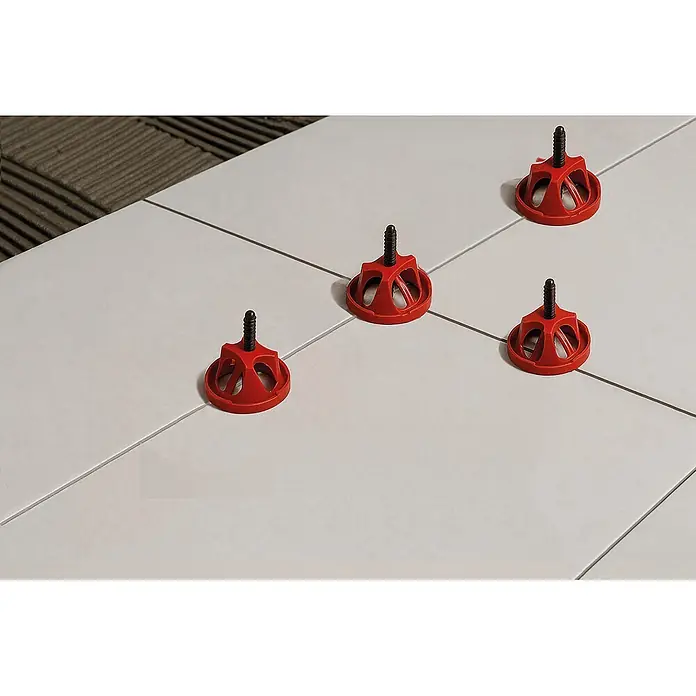 Heka Schraubstifte Turnfix - 100 Stk., Passend für: Fugenbreite 2 mm - Rote Nivellierkappen mit schwarzen Gewindespindeln fixieren hellgraue Fliesen auf Fliesenkleber.