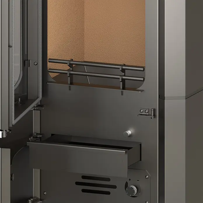 Kaminofen Prestige - 7 kW, Raumheizvermögen: 200 m³, Material Verkleidung: Stahl - Innenansicht eines dunklen Metallofens/Grills mit zwei Drehspießen, einer Auszugsschale und einem Bedienknopf.