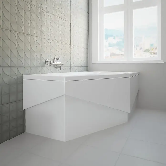 Bad Land Eckbadewanne MARIKA Acryl-Eckwanne 140 x 80 cm rechts Weiß - L x B: 140 x 80 cm, Sanitäracryl, Weiß - Moderne weiße Badewanne mit eckiger Designblende, in einem hellen Badezimmer mit strukturierten grauen Fliesen.