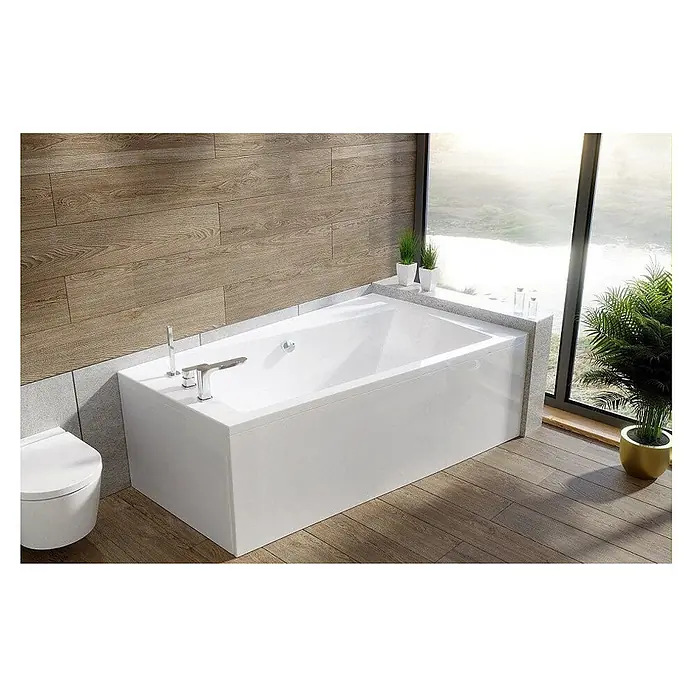 Bad Land Eckbadewanne INFINITY Acryl-Eckwanne 170 x 110 cm rechts Weiß, inkl. Styroporverkleidung - Sanitäracryl, Weiß - Weiße rechteckige Badewanne mit Chromarmatur, in ein modernes Badezimmer neben einem großen Fenster integriert.