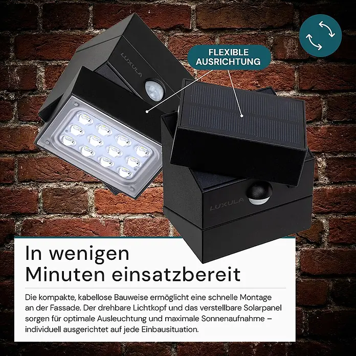 Luxula Solar-Außenwandleuchte - Schwarz, IP65, 300 lm - Schwarzer Solar-LED-Strahler mit flexibler Ausrichtung, an einer Ziegelwand montiert.