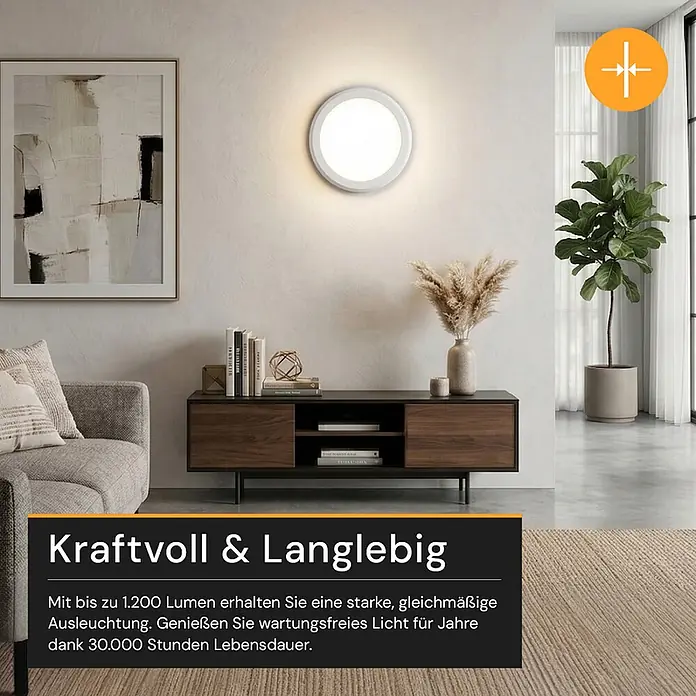 Enovalite LED-Deckenleuchte rund - 12 W, Ø x H: 16,5 x 1,95 cm, Weiß, Weiß, Mehrfarbig - Helle, runde LED-Wandleuchte an einer Wand in einem modernen Wohnzimmer montiert.