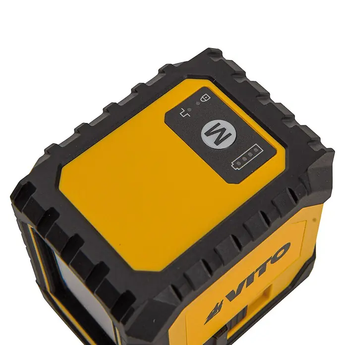 Vito Nivel láser en cruz VINLLC25 - Zona de trabajo máx.: 25 m - Nivel láser amarillo y negro con carcasa protectora robusta, mostrando un panel de control con indicador de batería y símbolos de modo.
