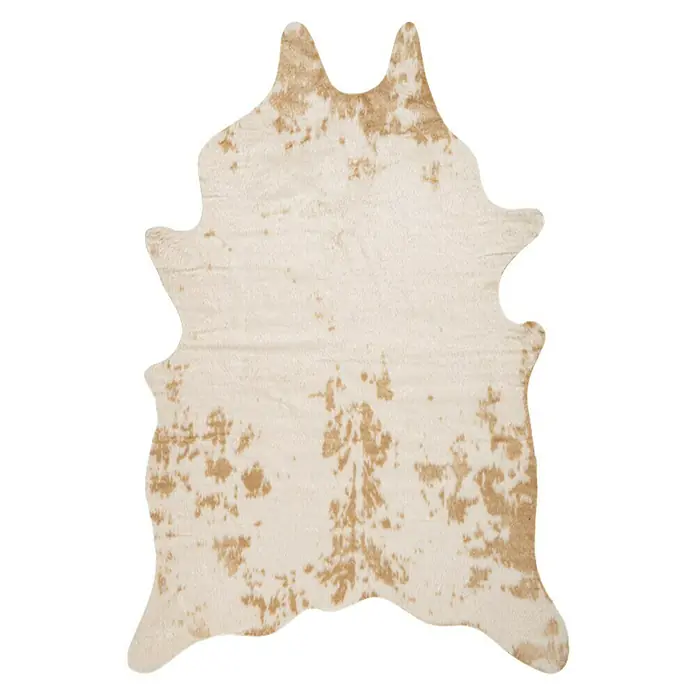 Piel sintética - Vaca, Beige, 200 x 150 cm, 100 % poliéster - Una alfombra con forma de piel de vaca en blanco y beige. La alfombra tiene una forma irregular y un patrón moteado.