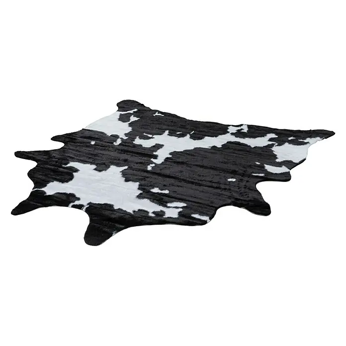 Kunstfell Rodeo - Schwarz/Weiß, 200 x 150 cm, 100 % Polyester, Kuh - Kunstfellteppich im Kuhfellmuster, schwarz und weiß, verleiht jedem Raum einen Hauch von rustikalem Charme. Perfekt als dekoratives Element.