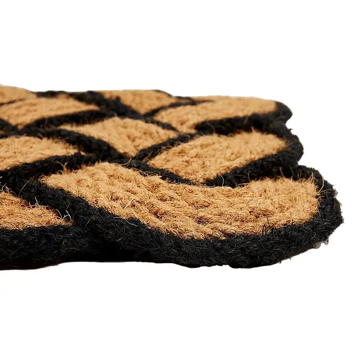 Fußmatte Nature Classic - 75 x 45 cm, Natur/Schwarz, Material Nutzschicht: 100 % Kokos - Nahaufnahme einer Fußmatte aus naturfarbener und schwarzer geflochtener Kokosfaser mit erhabenem Muster.