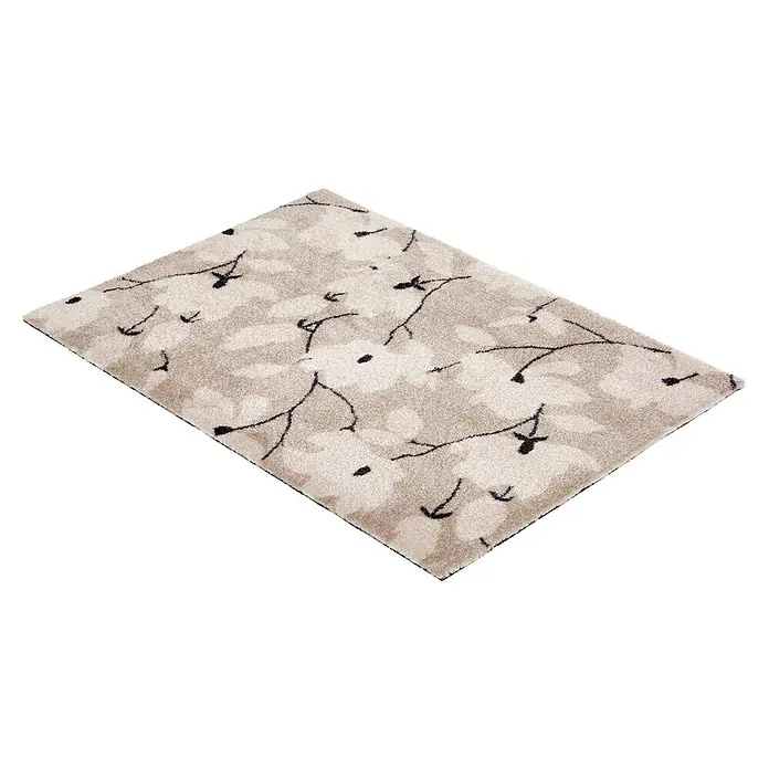 Fußmatte Malibu - 100 x 67 cm, Creme, Material Nutzschicht: 100 % Polyamid, Blumen - Ein rechteckiger Teppich in Creme und Hellbeige mit schwarzen stilisierten Blumen- und Astmustern.