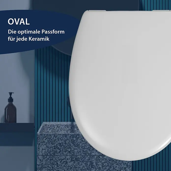 WC-Sitz La Digue - Thermoplast, Weiß, Mit Absenkautomatik - Weißer ovaler Toilettensitz von oben in einem modernen Badezimmer.