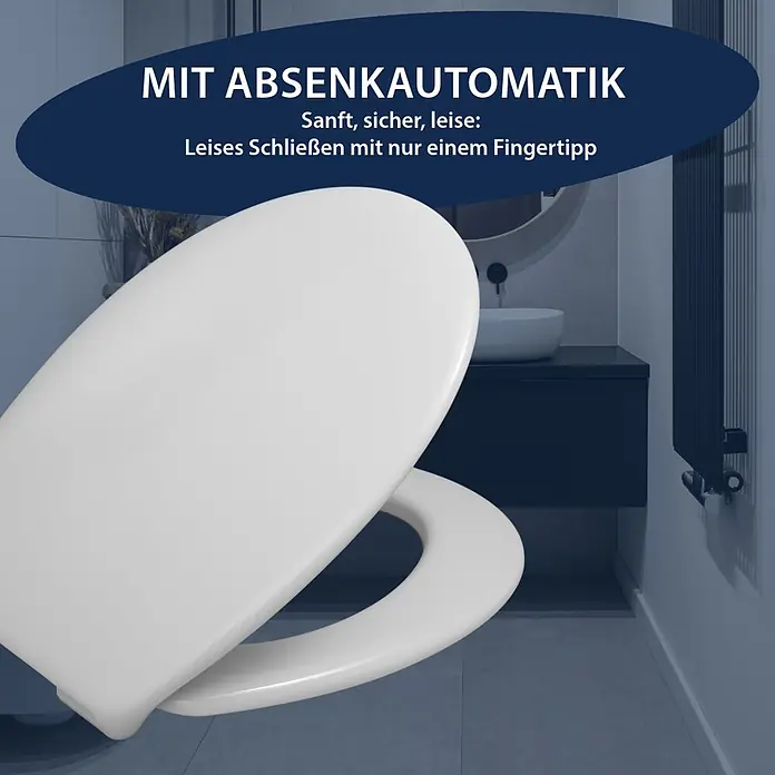 WC-Sitz La Digue - Thermoplast, Weiß, Mit Absenkautomatik - Weißer Toilettensitz mit Absenkautomatik in einem modernen Badezimmer, der sanftes und leises Schließen zeigt.